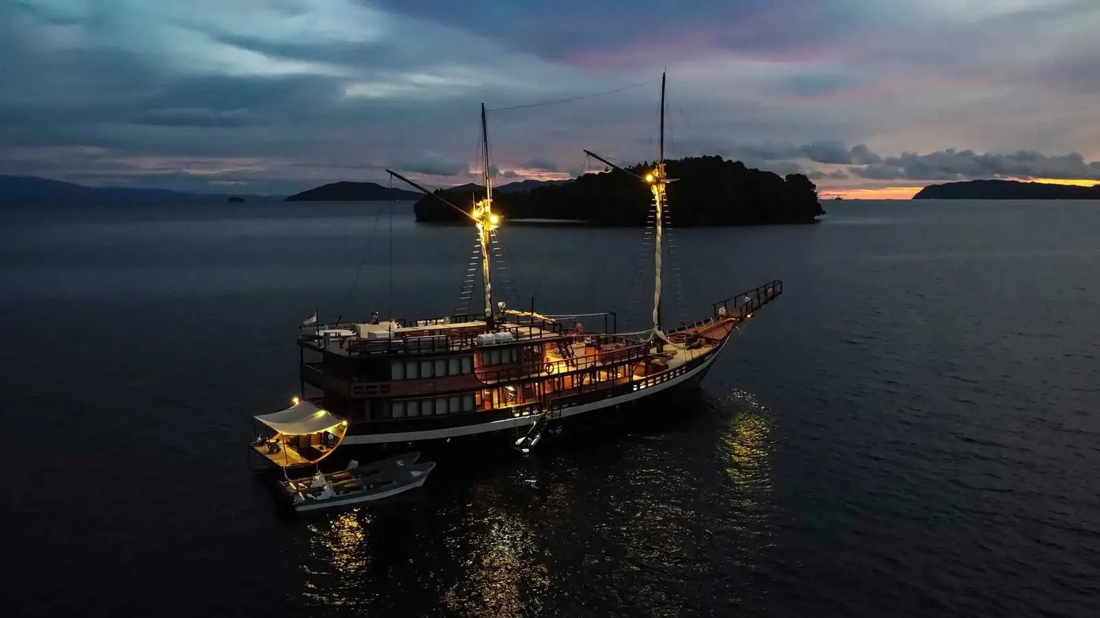 Coralia Liveaboard at anchor at dusk in Raja Ampat